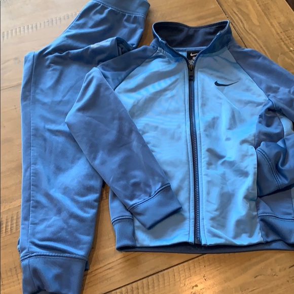 blue nike jogger suit